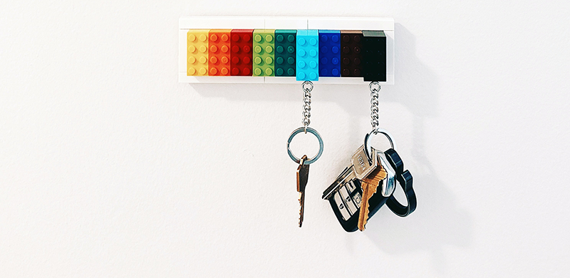 Lego keyrack with keys hanging from it